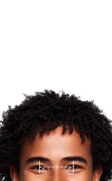 Model with a ruler showing the distance between the pupils