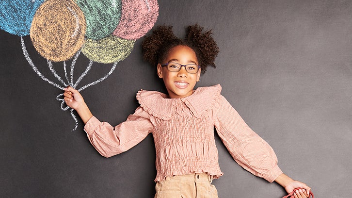 Two children wearing glasses.