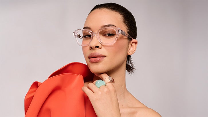 Female model wearing clear Pure eyeglasses