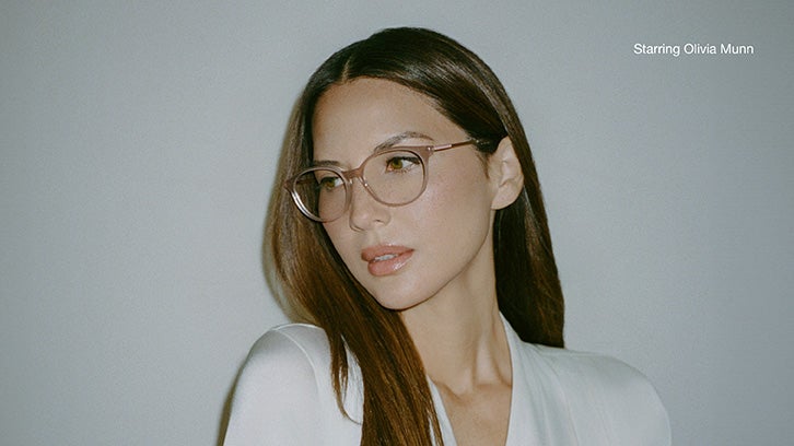 Olivia Munn wearing eyeglasses; text reads 'Starring Olivia Munn'.
